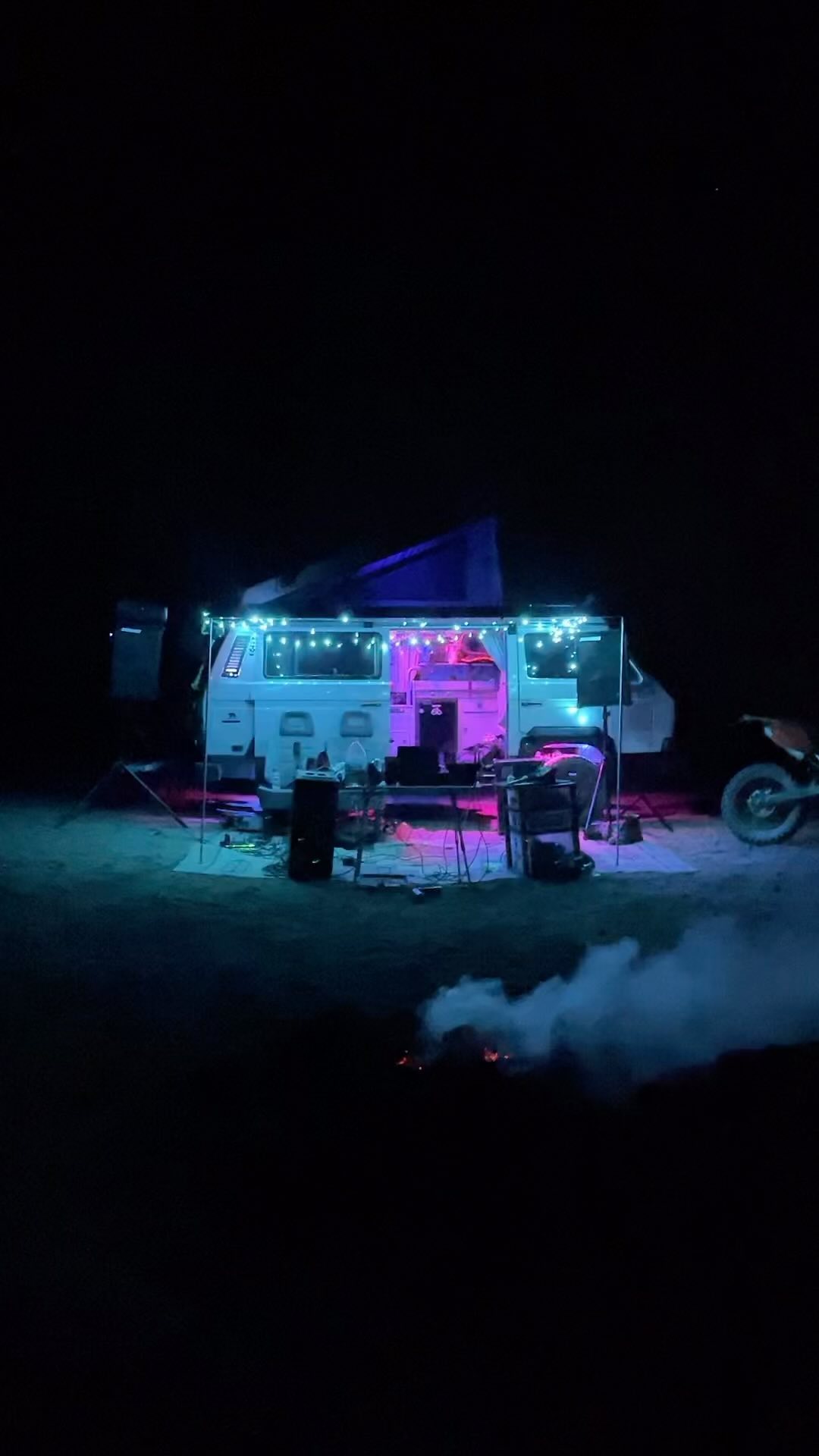 Westfalia campsite lit at night